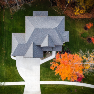 house viewed from the sky in the fall season