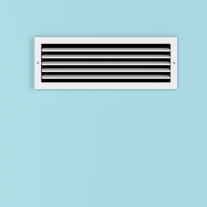 a wall vent against a light blue wall